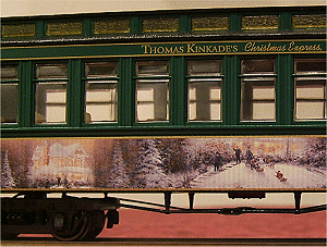 This detail of a coach from the original Thomas Kinkade Christmas Express shows the fine artwork and exquisite printing applied to each product in this series. Click for a bigger photo