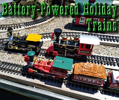 Battery-Powered Holiday Trains.  This photo compares the sizes of the three most reliable brands: New Bright (at the left), Scientific Toys/Ez-Tek (at the right), and Lionel (bottom).  Click for larger photo.